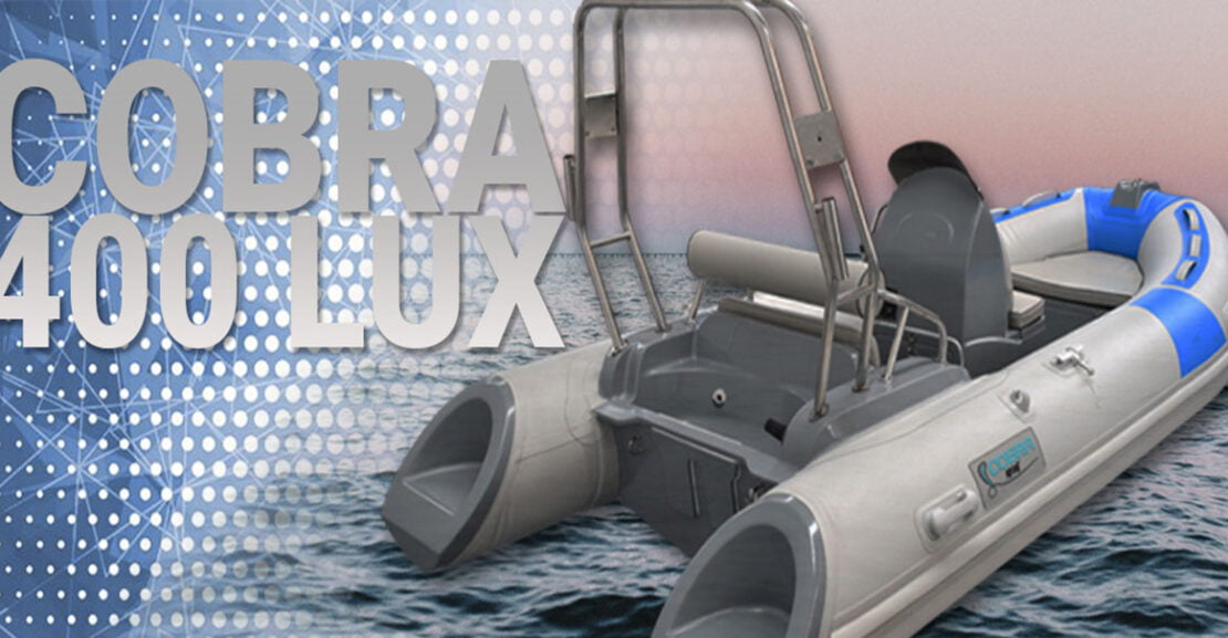Embarcación semirrígida Cobra 400 Lux equipada para pesca y recreo con arco de luces y cañeros.