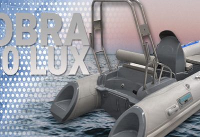 Embarcación semirrígida Cobra 400 Lux equipada para pesca y recreo con arco de luces y cañeros.